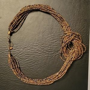 Multi strand brown seed bead necklace